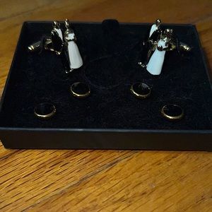 Bride and groom cuff links and black and gold studs.